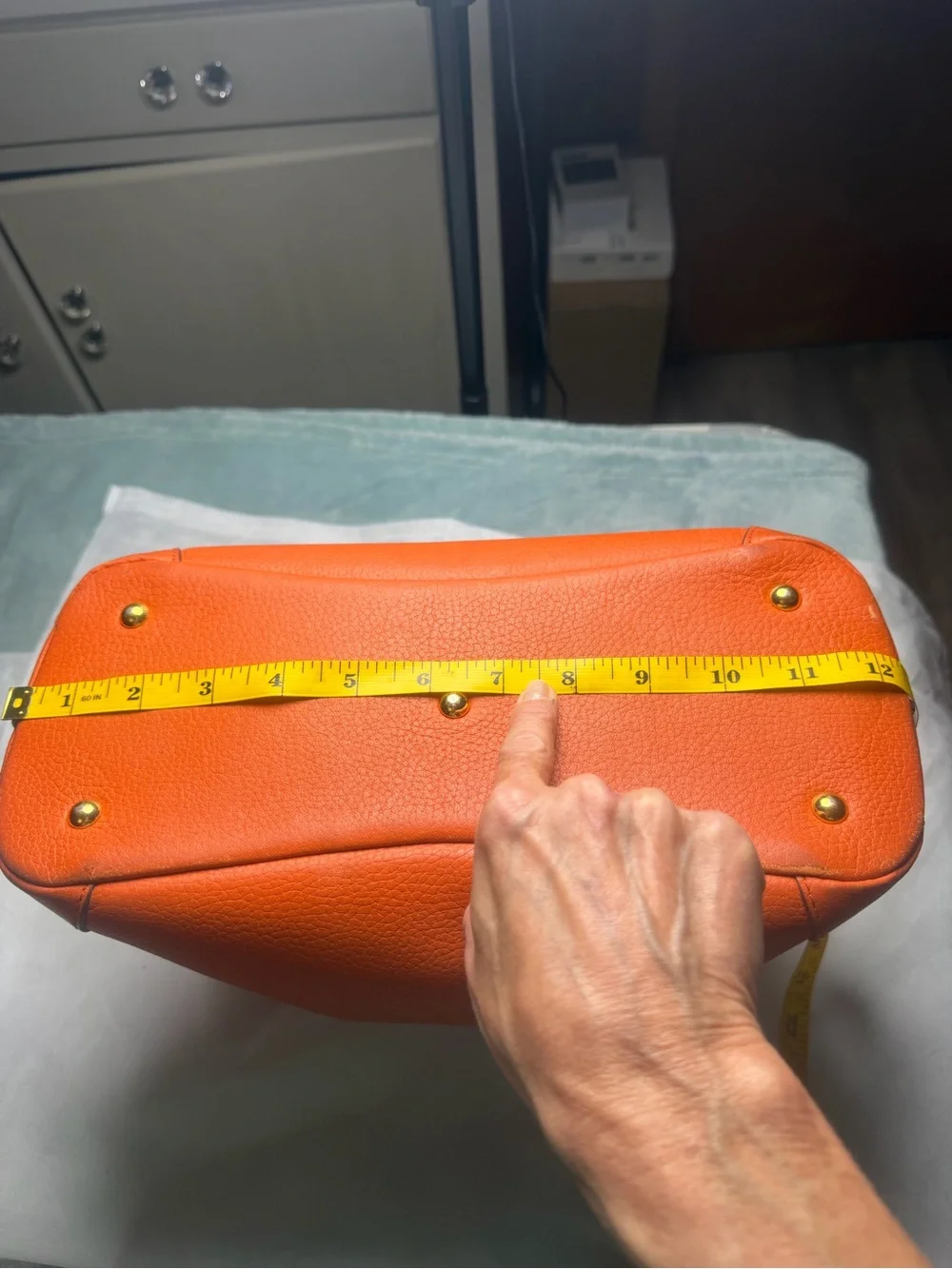 Structured Orange Leather Satchel with Top Handle and Crossbody Strap
